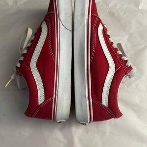 Vans Red and White Sneakers with Retro Design and Distinctive Side Stripe
